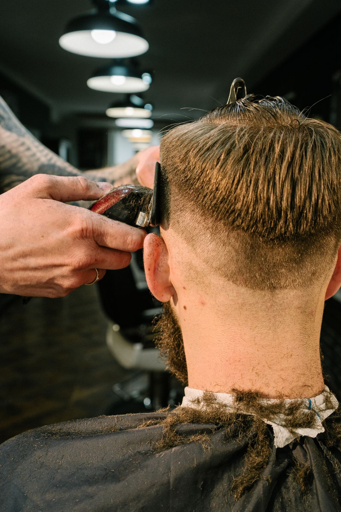 Barber cutting hair