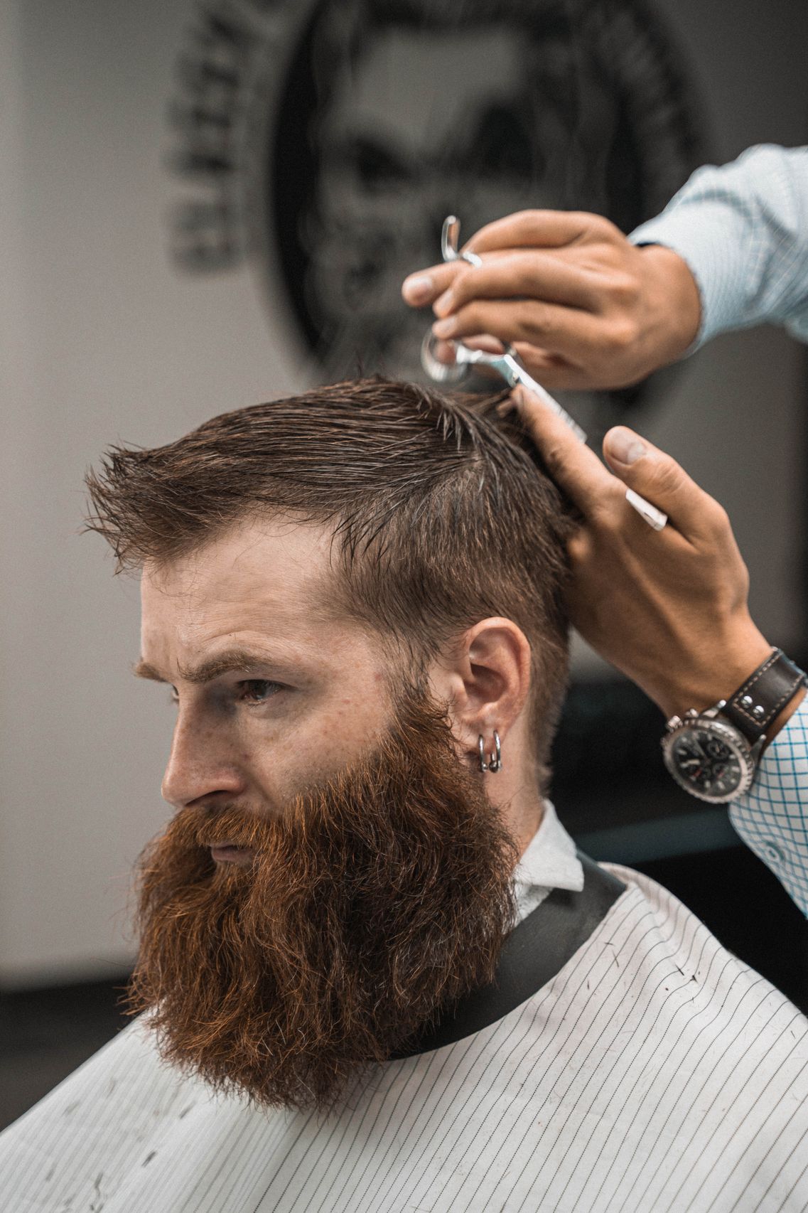 Barber cutting hair